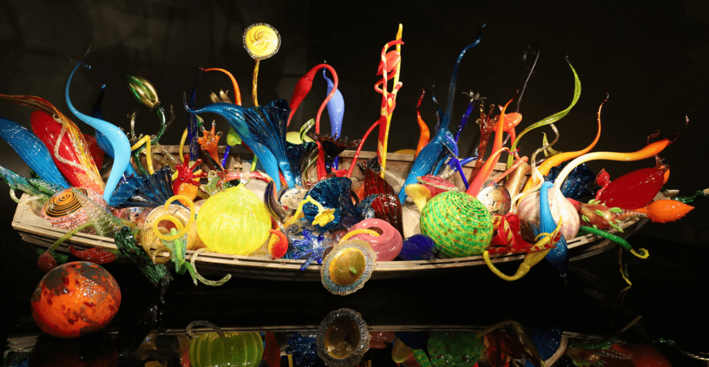 A beautiful, vibrant, and colorful artistic glass sculpture created by Dale Chihuly